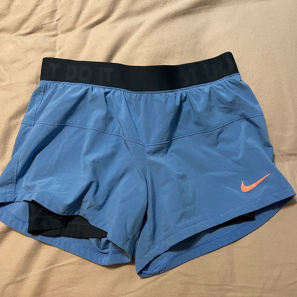 blue Nike shorts with built in navy spandex